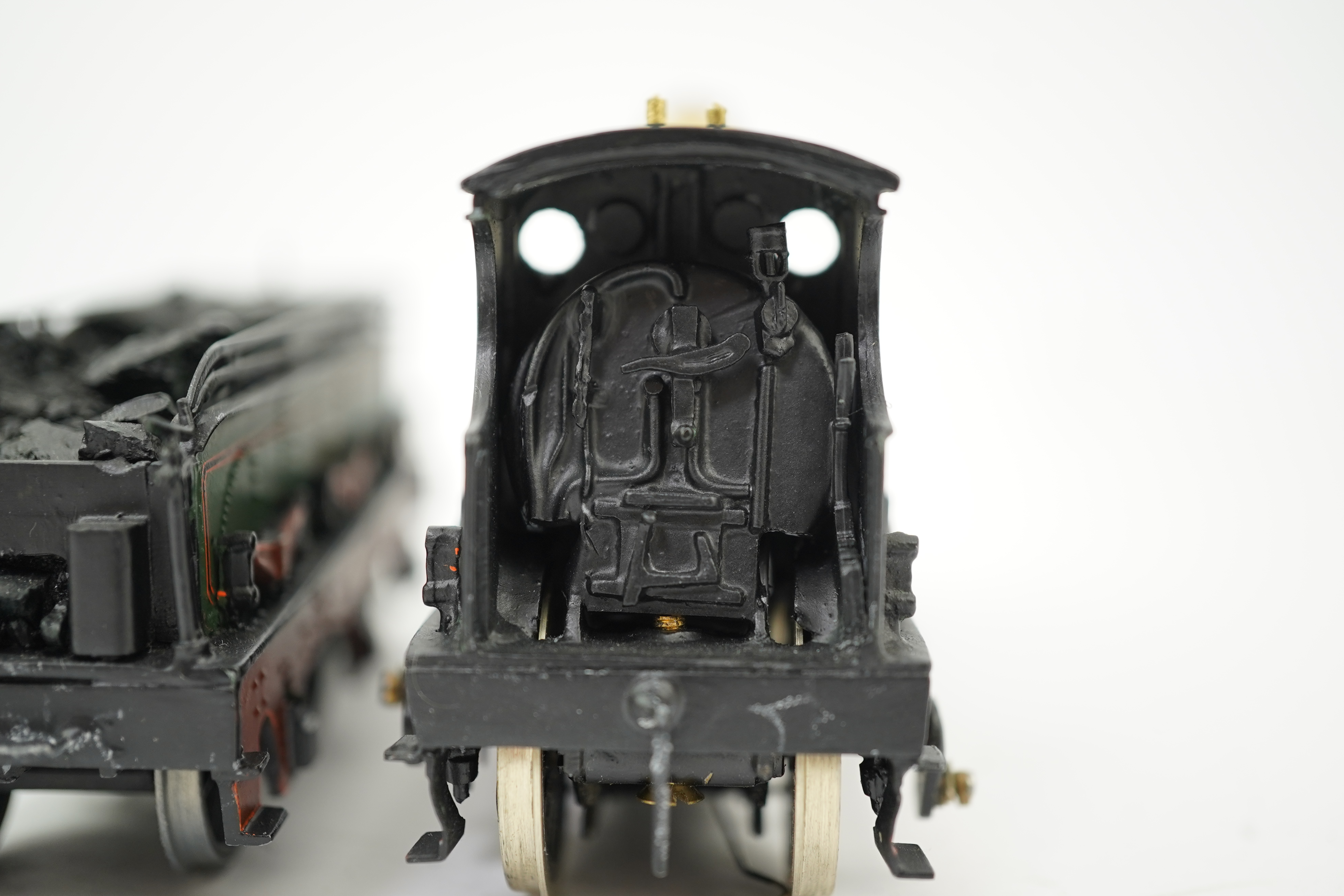 Two 00 gauge brass and white metal kit built GWR tender locomotives; an Armstrong 0-6-0, 671, together with an Earl class 4-4-0, Earl of Berkeley 3217, constructed, painted and lined to a high standard, both motored for